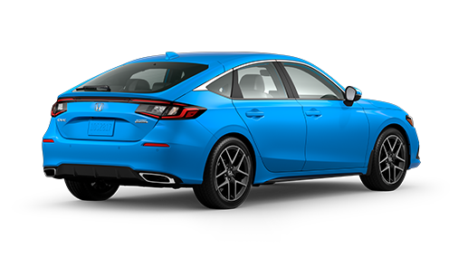 ¾ driver side rear facing view of 2023 Civic Hatchback Sport Touring model in Boost Blue colour