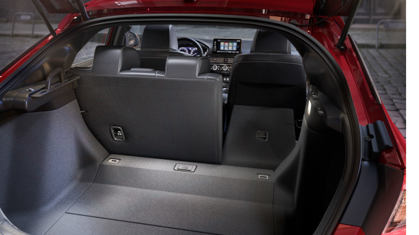 Closeup of the open hatch door, showcasing the Hatchback’s cargo space.  