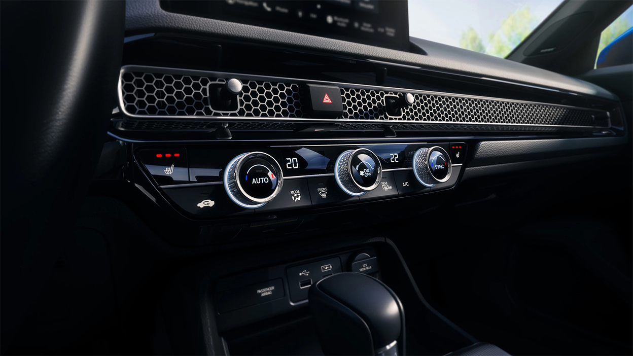 3/4 closeup of climate control dials.