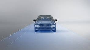 Front view of grey Civic Hatchback. Blue sensor waves and lines emit from the front. 