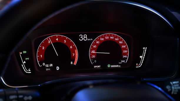 Close up of TFT screen, displaying tachometer, speedometer, odometer, fuel, etc.