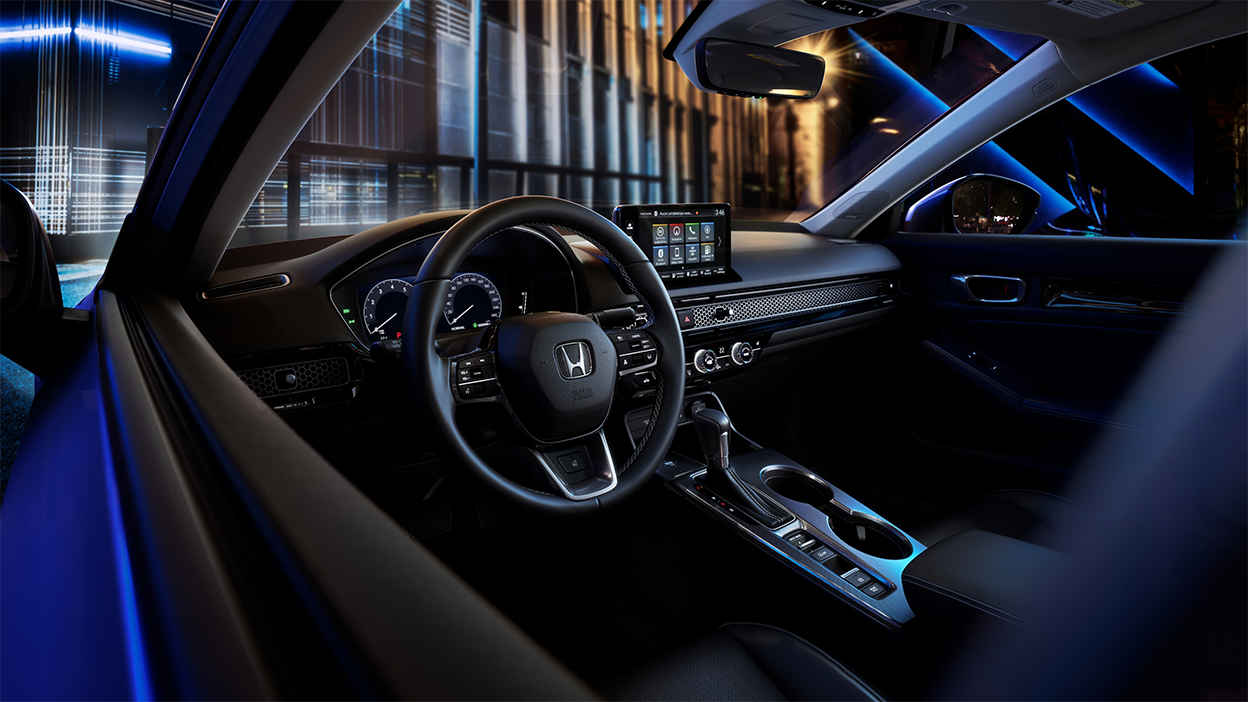 Vue du volant depuis la vitre du côté conducteur.