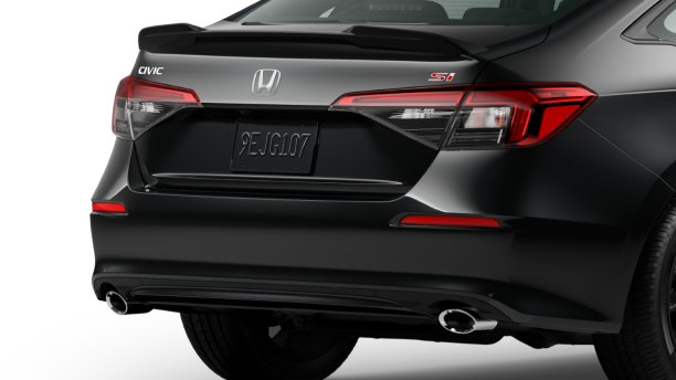 Gros plan arrière de trois quarts d’une Civic Si noire sur espace blanc.