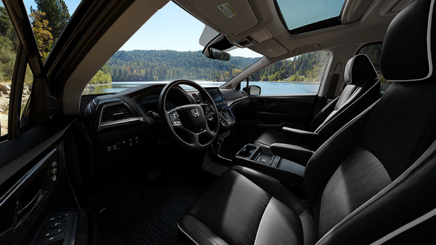 Interior view of Odyssey front seats; from driver’s side.
