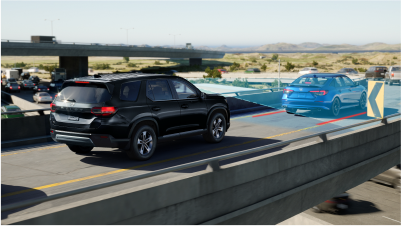 3/4 rear view of black Pilot on highway over pass. Blue sensor lines and waves detect the car in front. 