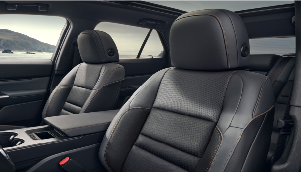 3/4 interior view of the driver and front passenger seats.