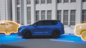 Computer-generated illustration with wide side view of a blue Prologue parallel parking on a city street. Blue sensor waves emit from the front and back of the Prologue, detecting the parked cars in front and behind it.