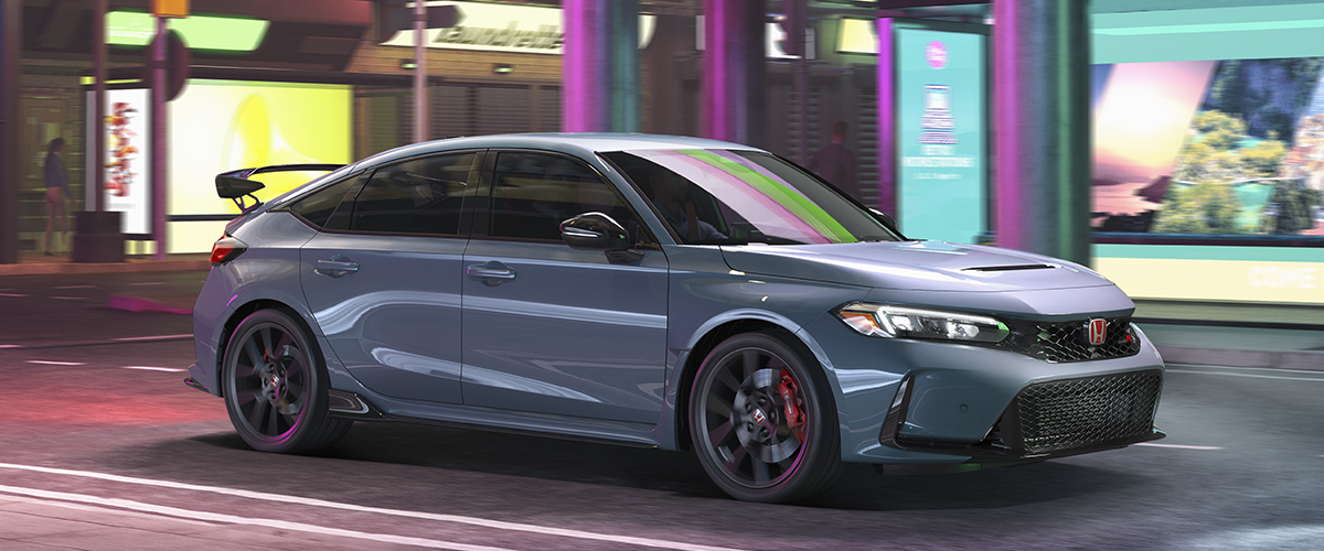 3/4 sideview of a greyish blue Type R driving in a futuristic city street, complemented by neon signs and lights.